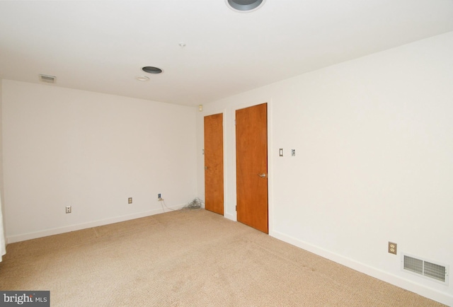 spare room with carpet flooring