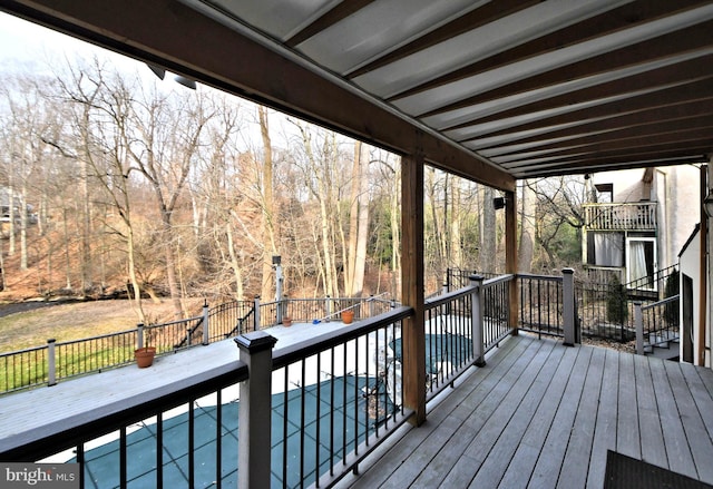 deck with a swimming pool