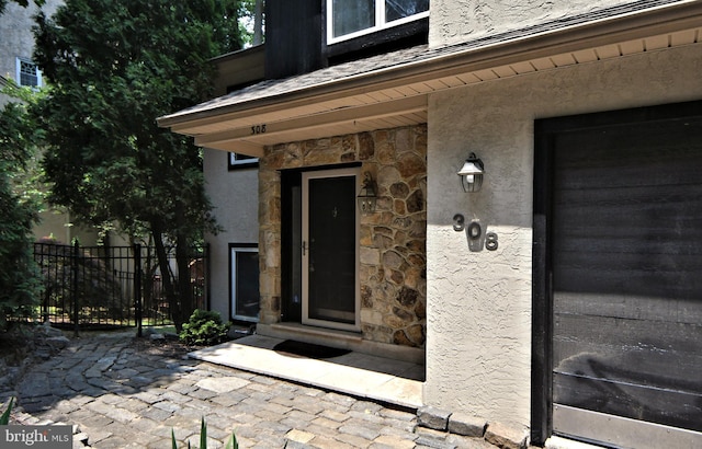 property entrance featuring a garage