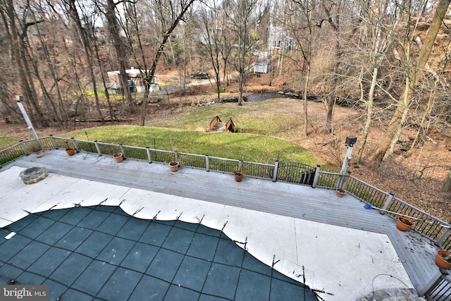 exterior space with a swimming pool side deck