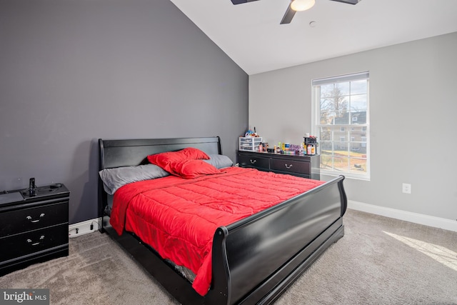 bedroom featuring carpet, vaulted ceiling, and ceiling fan