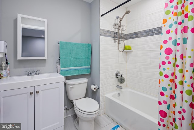 full bathroom featuring vanity, toilet, and shower / tub combo with curtain