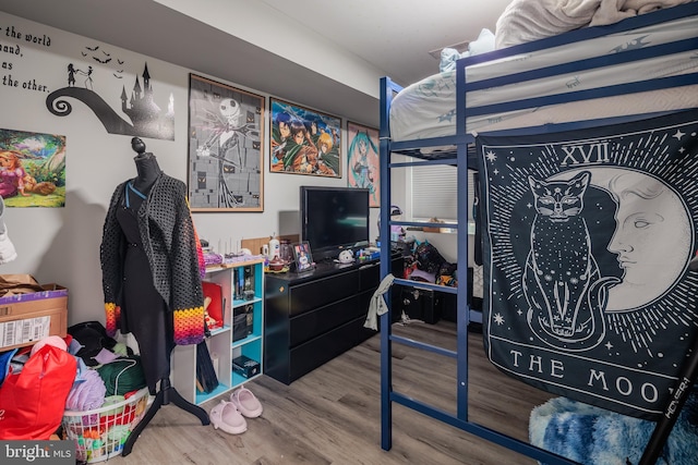 bedroom featuring wood-type flooring