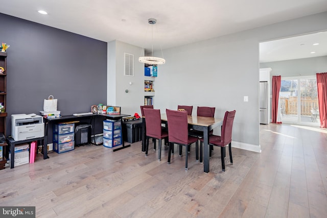 dining area featuring light hardwood / wood-style flooring