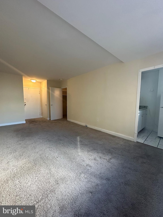 interior space featuring light colored carpet