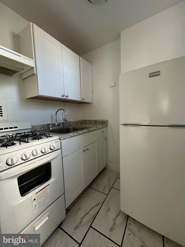 kitchen featuring white cabinets, white appliances, extractor fan, and sink