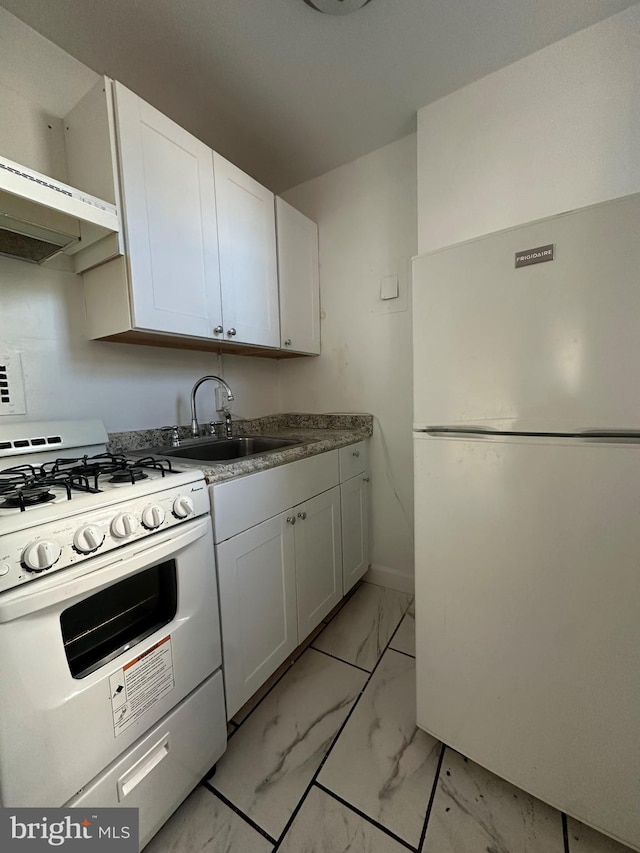 1121 Arlington Blvd Unit 226, Arlington, VA 22209 - kitchen with white appliances, a sink, light marble finish floors, and white cabinetry