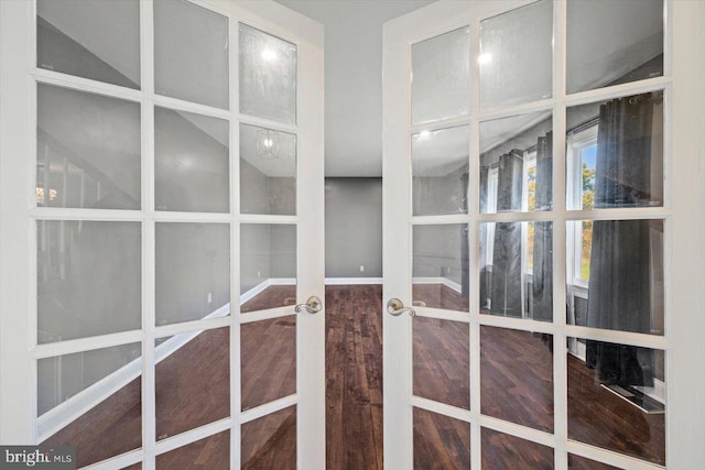 interior details featuring french doors and hardwood / wood-style floors