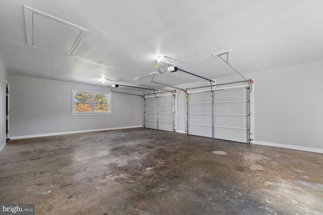 garage featuring a garage door opener