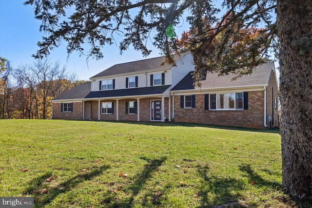 view of front facade with a front yard