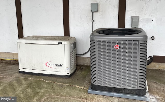 exterior details with concrete flooring and central AC unit