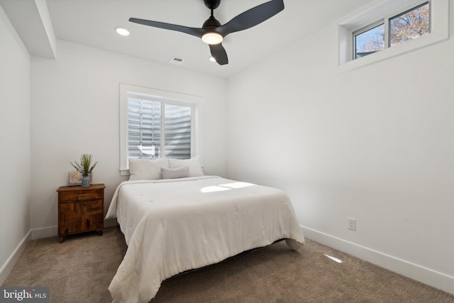 carpeted bedroom with ceiling fan