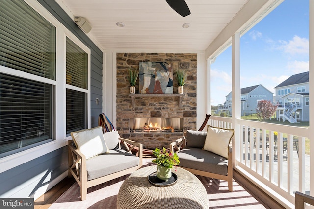 exterior space with an outdoor stone fireplace