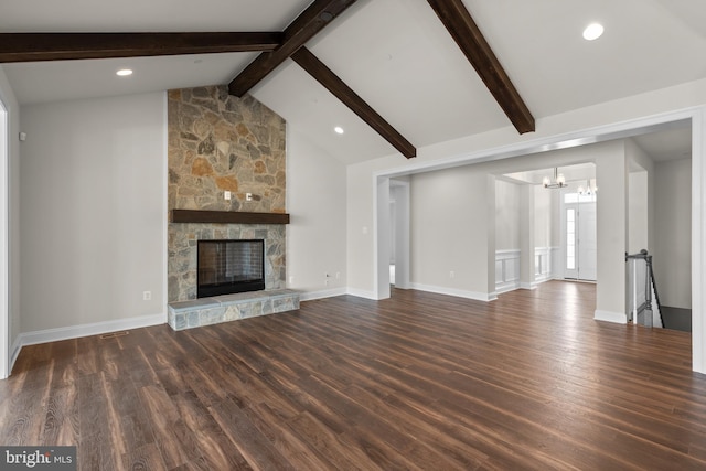 14628 Old Hanover Rd Regi, Unit Regi, Reisterstown, MD 21136 - unfurnished living room featuring a stone fireplace, lofted ceiling with beams, an inviting chandelier, and wood finished floors