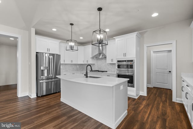14628 Old Hanover Rd Regi, Unit Regi, Reisterstown, MD 21136 - kitchen featuring wall chimney range hood, light countertops, stainless steel appliances, and a sink