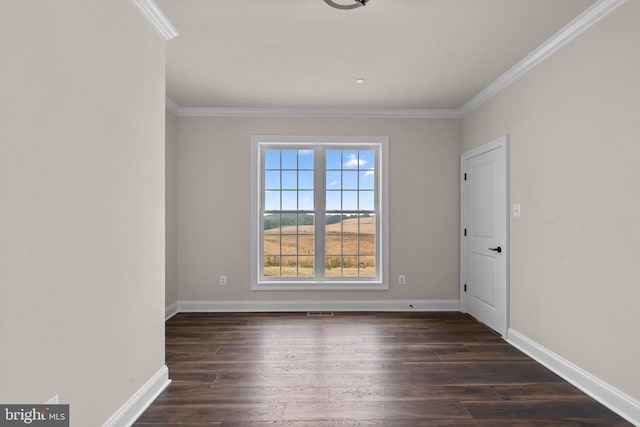 unfurnished room featuring crown molding and dark wood-type flooring