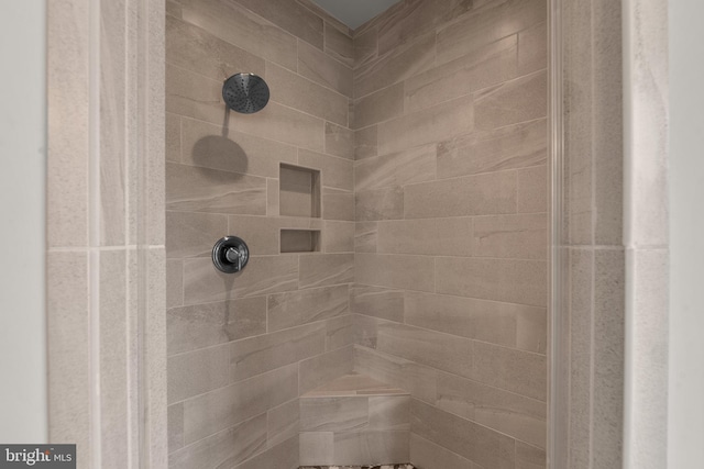 details featuring a tile shower