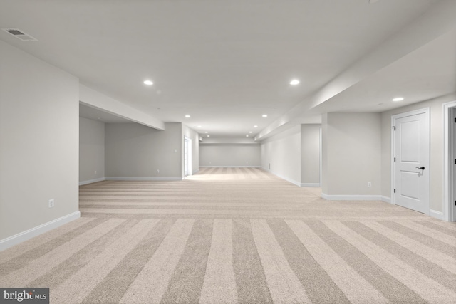 basement with light carpet