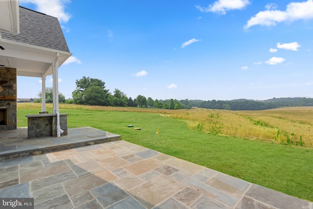 view of patio featuring a rural view