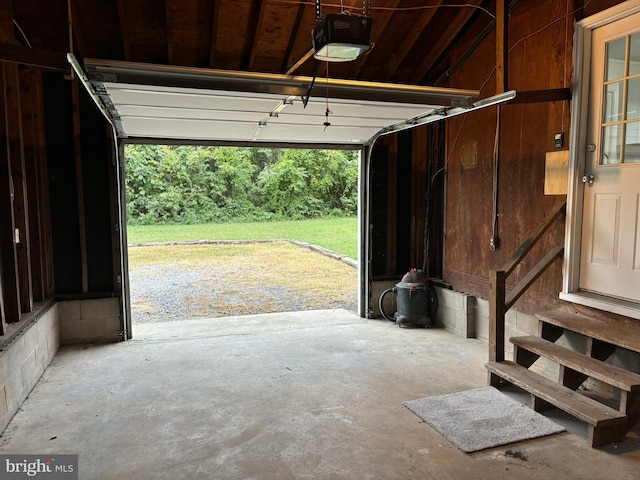 garage featuring a garage door opener