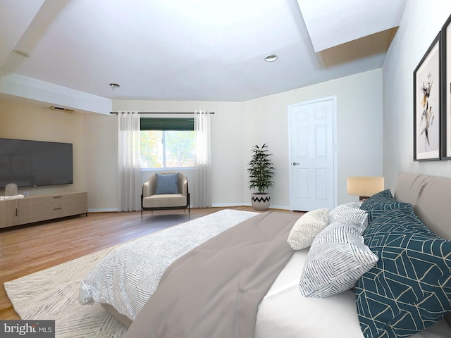 bedroom with hardwood / wood-style flooring