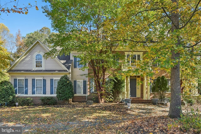 708 Church Rd S, Upper Marlboro, MD 20774 - view of front of home with a balcony and brick siding