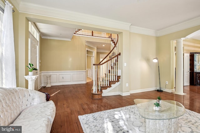 708 Church Rd S, Upper Marlboro, MD 20774 - living area with stairway, ornamental molding, ornate columns, and wood finished floors