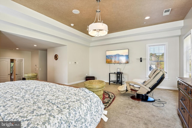 bedroom with light carpet