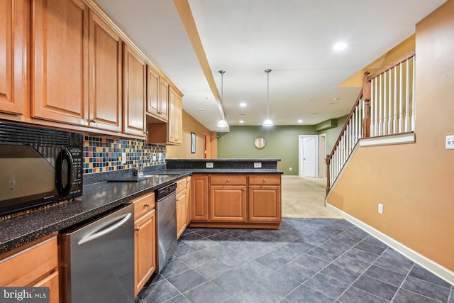 kitchen with black microwave, stainless steel dishwasher, decorative light fixtures, and backsplash