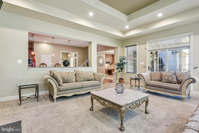 708 Church Rd S, Upper Marlboro, MD 20774 - carpeted living room with a tray ceiling, a wealth of natural light, baseboards, and recessed lighting