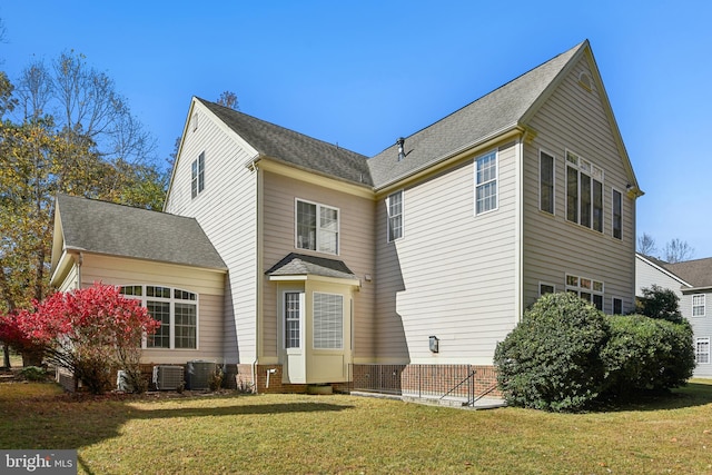 view of home's exterior with a lawn