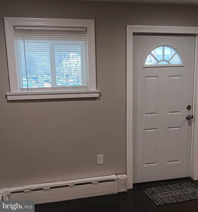 entrance foyer featuring a baseboard radiator