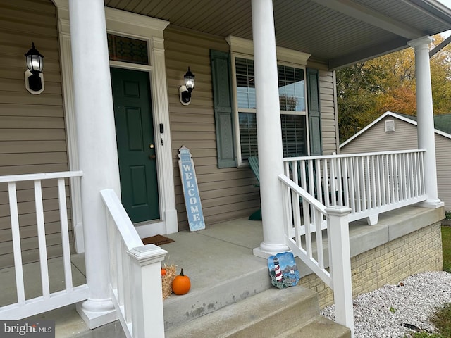 entrance to property with covered porch