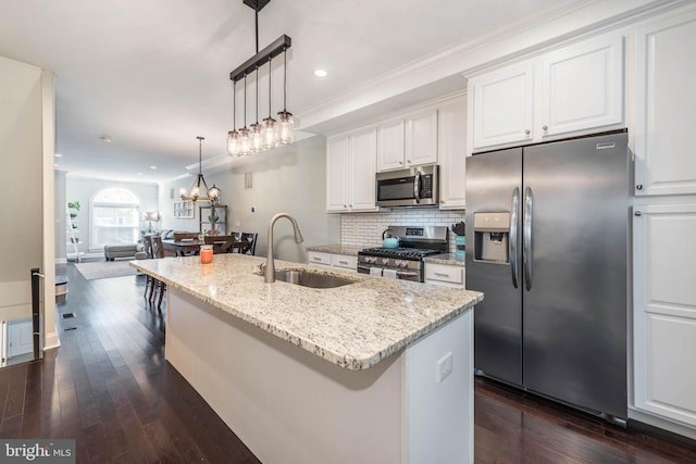 kitchen with white cabinetry, appliances with stainless steel finishes, and sink