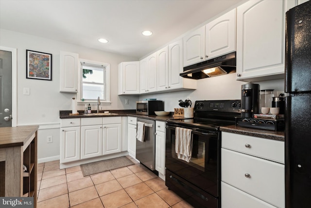 kitchen featuring white cabinets, black appliances, and sink