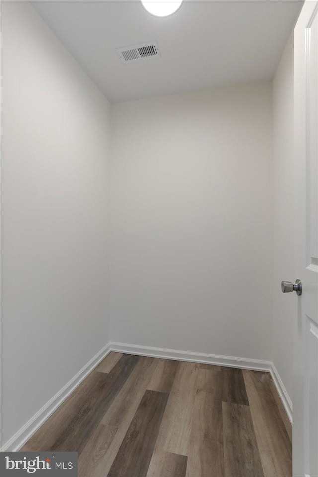 unfurnished room featuring hardwood / wood-style floors