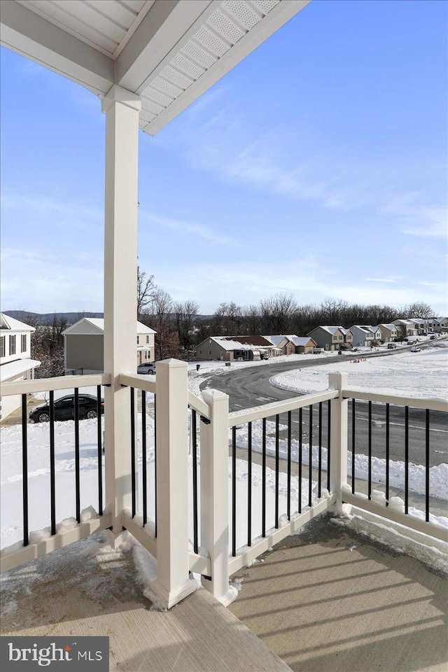 view of snow covered deck