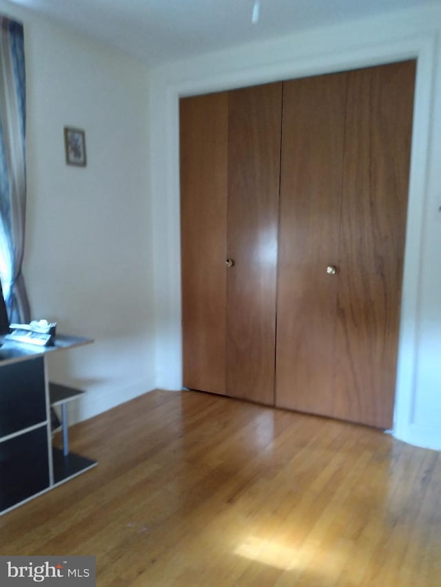 bedroom with light wood-type flooring