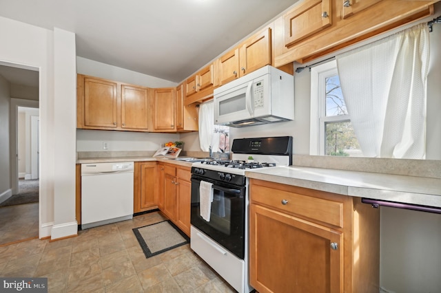 kitchen featuring white appliances