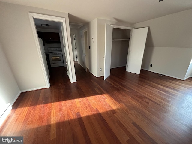 unfurnished bedroom featuring dark wood-type flooring