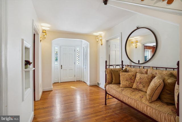 foyer with light hardwood / wood-style floors