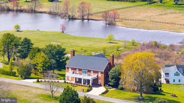 aerial view featuring a water view