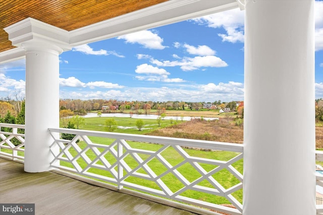 balcony featuring a water view