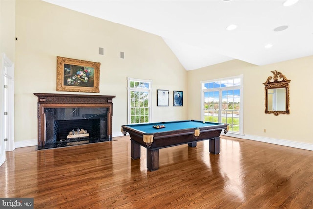 game room featuring high vaulted ceiling, a fireplace, wood-type flooring, and billiards