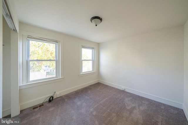 view of carpeted spare room