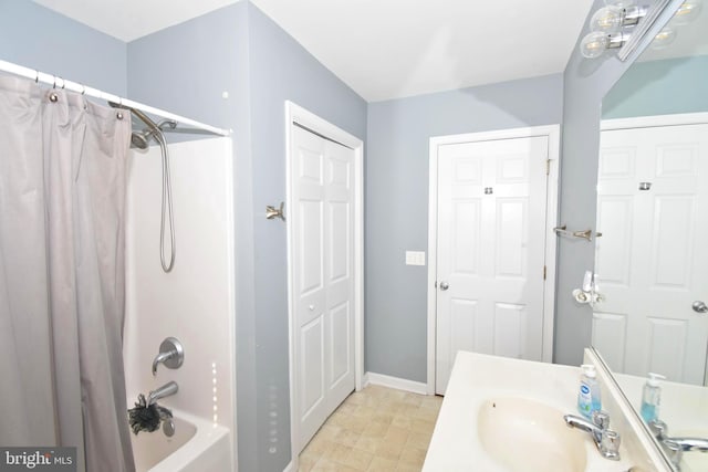 bathroom with vanity and shower / bathtub combination with curtain