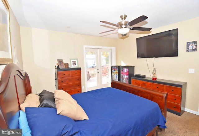 carpeted bedroom featuring access to exterior, french doors, and ceiling fan