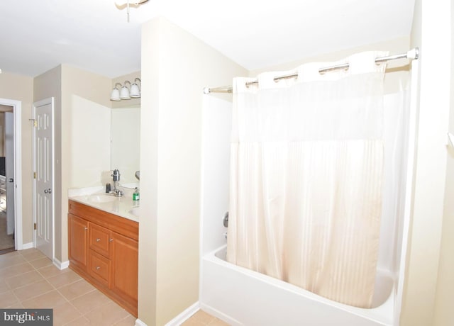 bathroom with shower / bath combo, tile patterned flooring, and vanity