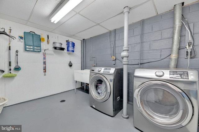 washroom with washer and clothes dryer