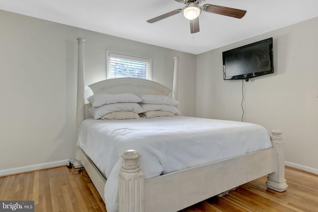 bedroom featuring ceiling fan and hardwood / wood-style floors